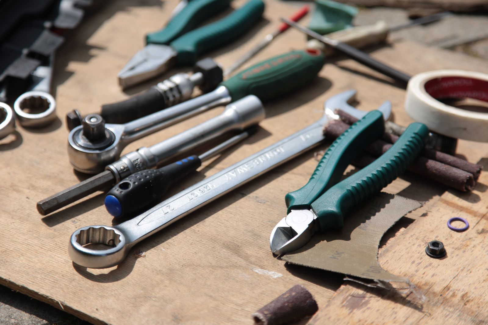 An engineer’s hand tools laid out on a workbench