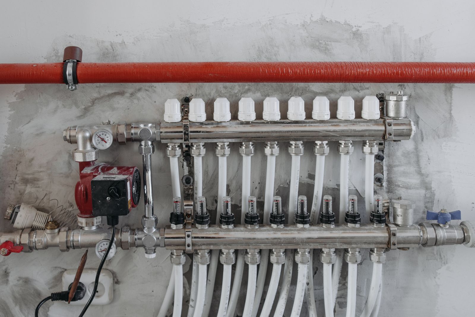 An underfloor heating manifold distributing the floor loops